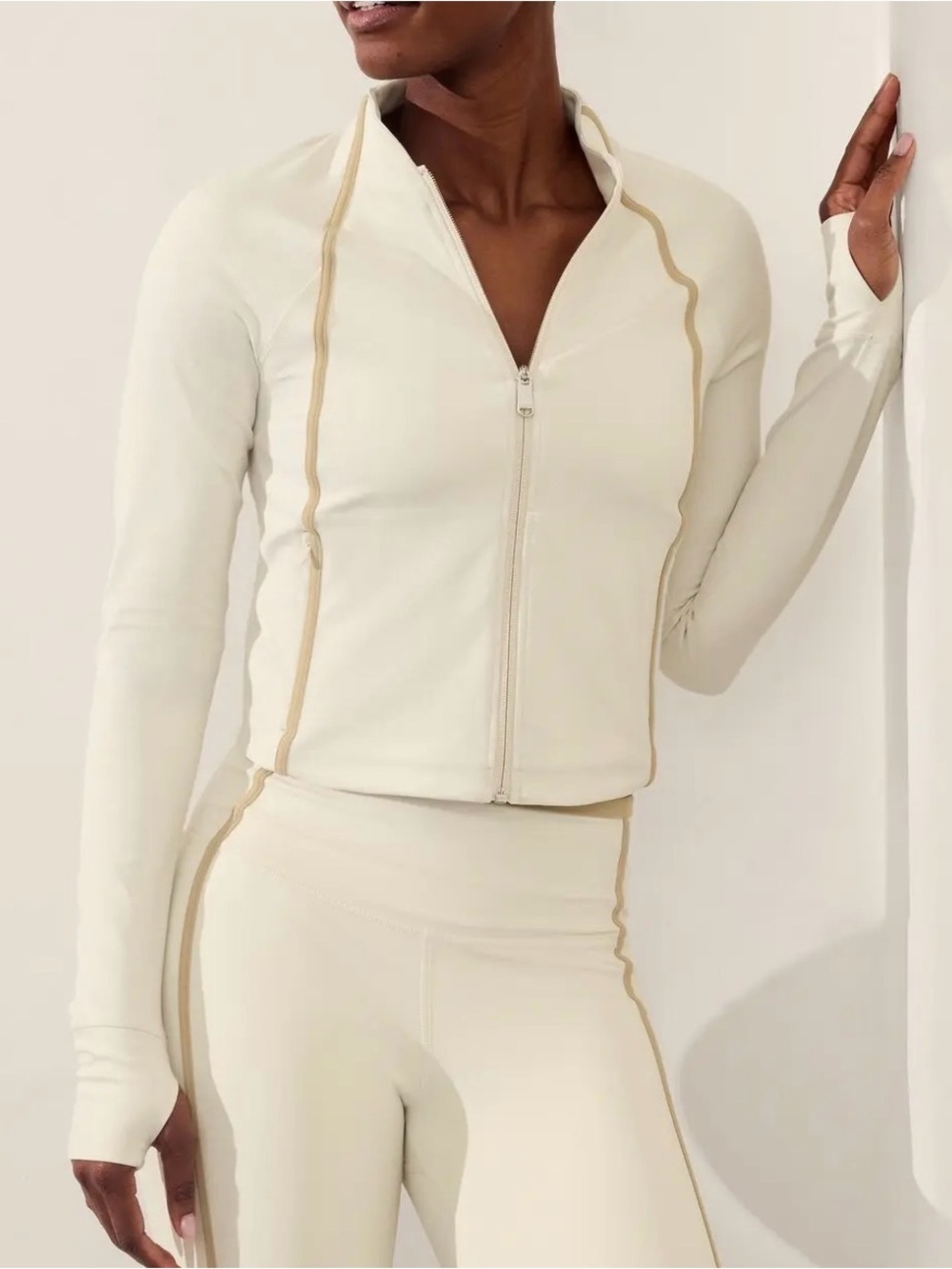 Athleta Salutation Crop Jacket in a cream and tan colorway